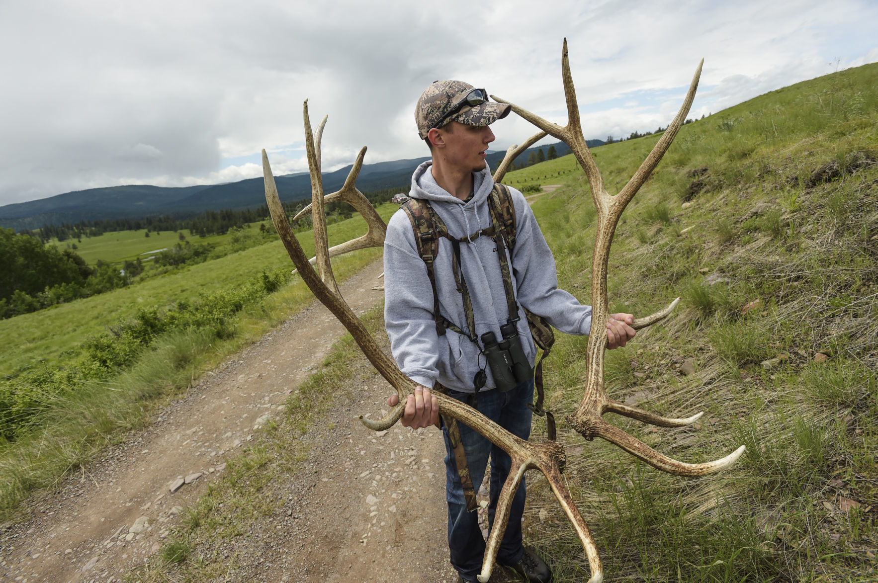 Dakota Diller admires his load of bull elk shed antlers
